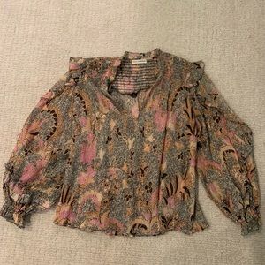 Ulla Johnson long sleeve blouse with gold detailing, pinks, yellows, and blacks